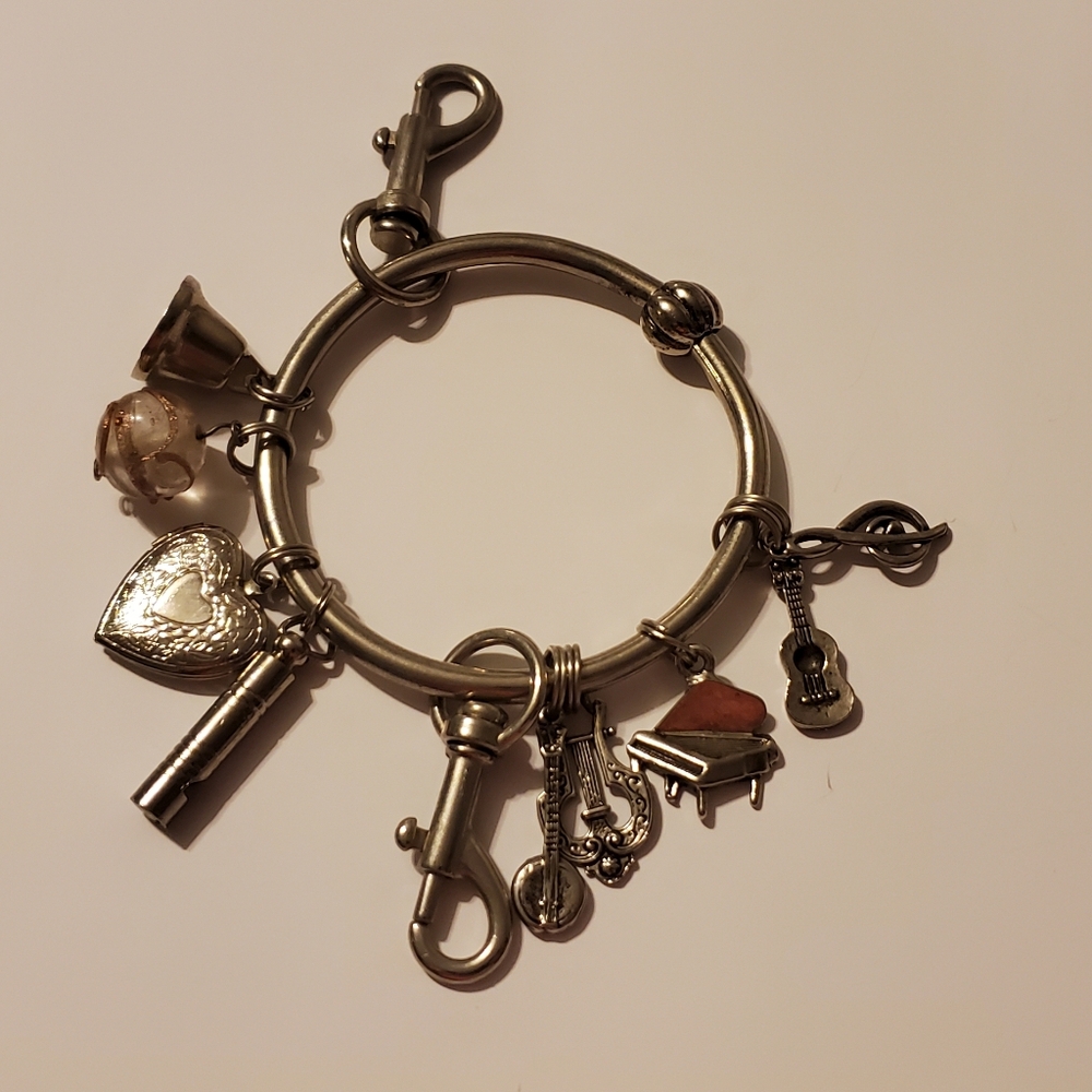 Vintage Green Rhino Charm Bracelet with Musical and Heart Charms